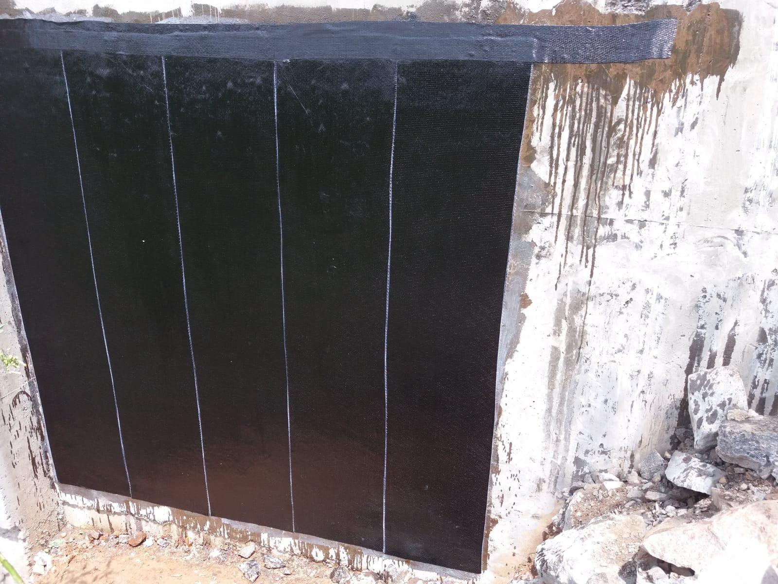 Parede reforçada com fibra de carbono